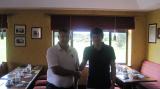 Tommy presents Derek jr with first prize.JPG
